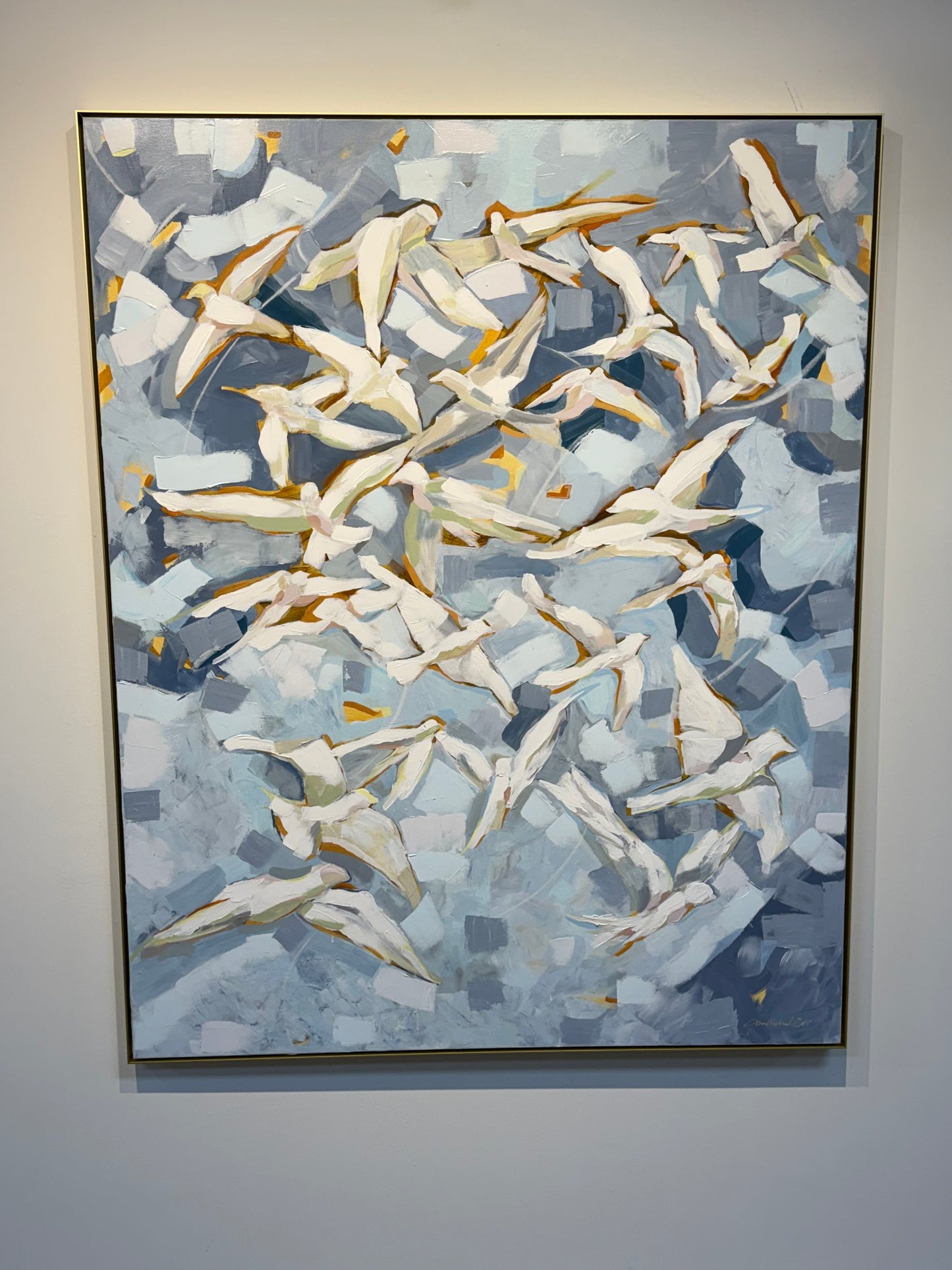 Georgia skyscape with burst of white birds.
